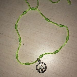 neon yellow anklet with a peace sign!!
